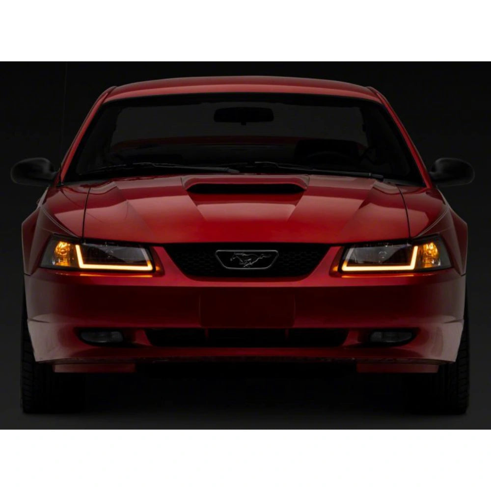 Raxiom 99-04 Ford Mustang Axial Series Headlights w/ Sequential LED Bar- Black Housing (Clear Lens) - Raxiom 422713