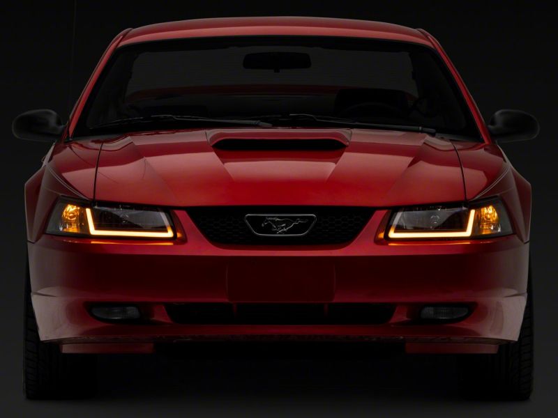 Raxiom Raxiom 99-04 Ford Mustang Axial Series Headlights w/ Sequential LED Bar- Black Housing (Clear Lens)