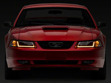 Load image into Gallery viewer, Raxiom Raxiom 99-04 Ford Mustang Axial Series Headlights w/ Sequential LED Bar- Black Housing (Clear Lens)