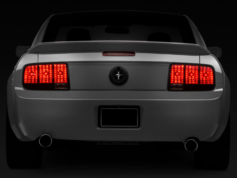 Raxiom 05-09 Ford Mustang Tail Lights- Black Housing (Smoked Lens) - Raxiom 49066