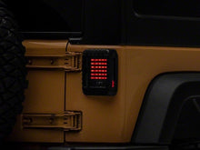 Load image into Gallery viewer, Raxiom 07-18 Jeep Wrangler JK LED Tail Lights- Black Housing (Smoked Lens) - Raxiom J115435