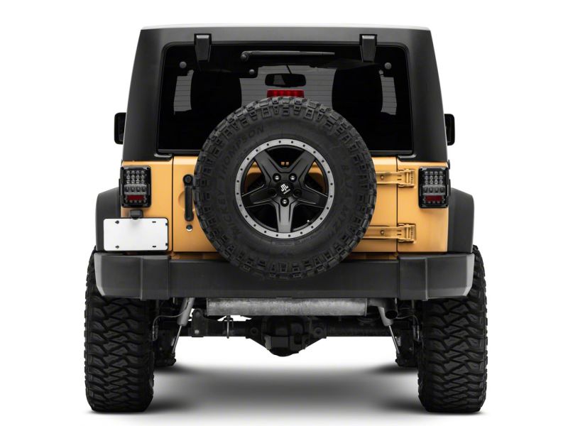 Raxiom 07-18 Jeep Wrangler JK Axial Series Lux LED Tail Lights- Black Housing (Clear Lens) - Raxiom J141596