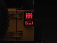 Load image into Gallery viewer, Raxiom 07-18 Jeep Wrangler JK Axial Series Lux LED Tail Lights- Black Housing (Clear Lens) - Raxiom J141596