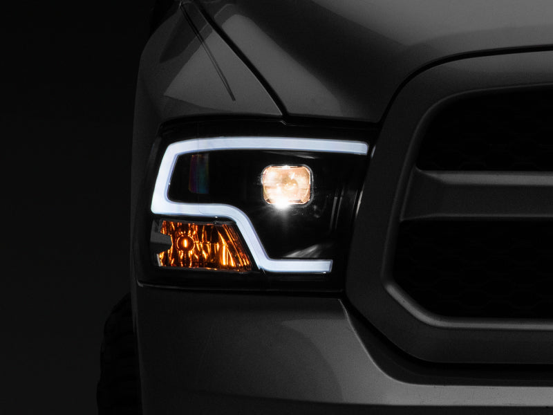 Raxiom 09-18 RAM 1500 LED Halo Projector Headlights- Black Housing (Clear Lens) - Raxiom R111516
