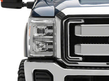 Load image into Gallery viewer, Close-up of the front corner of a Ford Super Duty showing the Raxiom headlight and its LED accent bar unlit