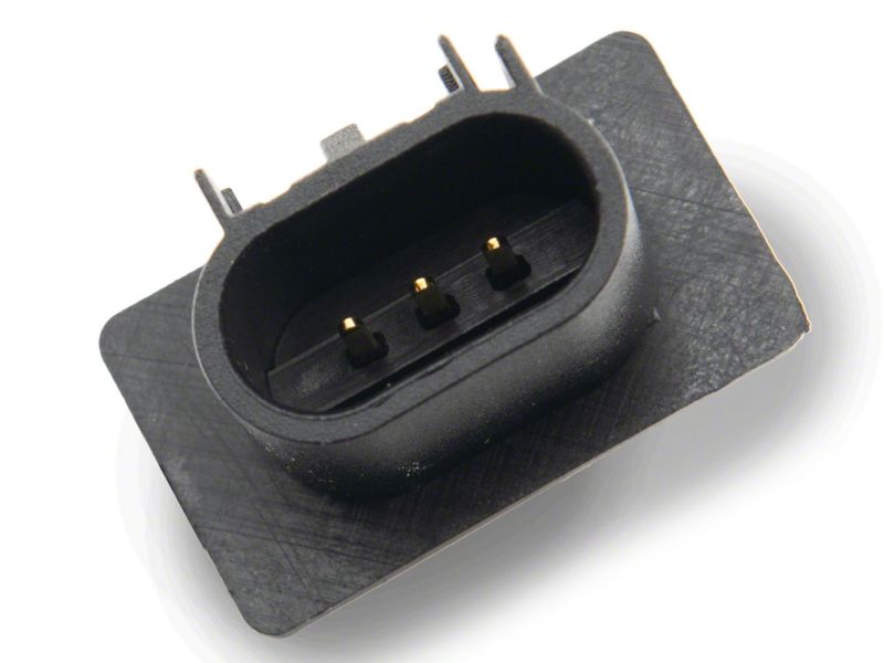 Close-up of the three pin factory style plug connector on the back of the Raxiom Super Duty headlight