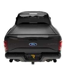 Load image into Gallery viewer, Retrax 90235 PowertraxPRO MX fully retracted showing canister and LED light