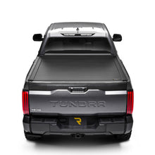 Load image into Gallery viewer, Side view of Retrax EQ on Ram 1500 with RamBox cargo system