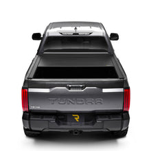 Load image into Gallery viewer, Side view of Retrax EQ on Ram 1500 with RamBox cargo system
