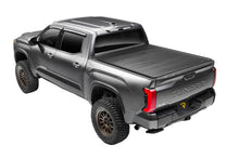 Load image into Gallery viewer, Retrax EQ electric retractable cover closed on 2024 Ram 1500 with RamBox