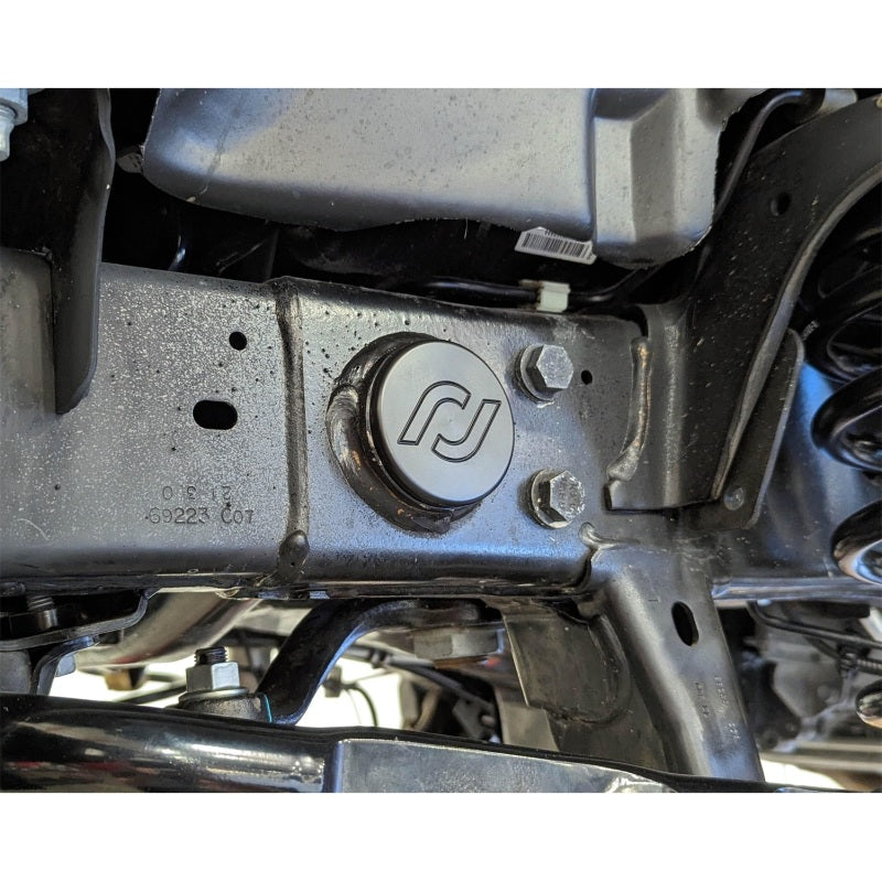 RockJock JK Frame Tube Plugs Frame Front CNC Machined Black Delrin mounted on vehicle installation view