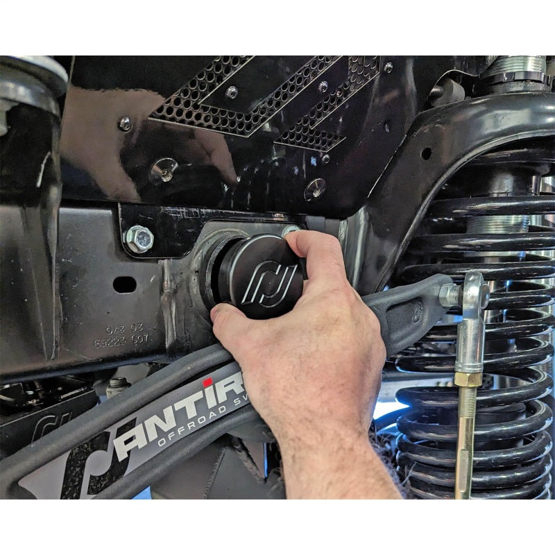 RockJock JK Frame Tube Plugs Frame Front CNC Machined Black Delrin mounted on vehicle installation view