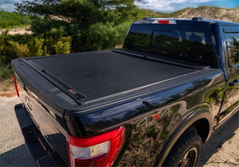 Roll-N-Lock 08-16 Ford F-250/F-350 Super Duty LB 93-3/8in M-Series Retractable Tonneau Cover - Black Ops Auto Works