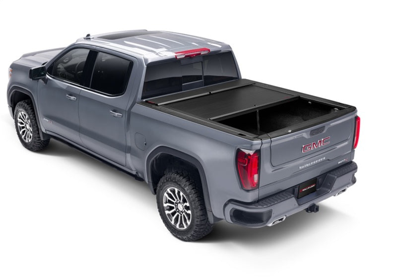 Roll-N-Lock 09-18 RAM 1500 / 10-22 RAM 2500-3500 (76.3in. Bed Length) A-Series XT Retractable Cover - Black Ops Auto Works