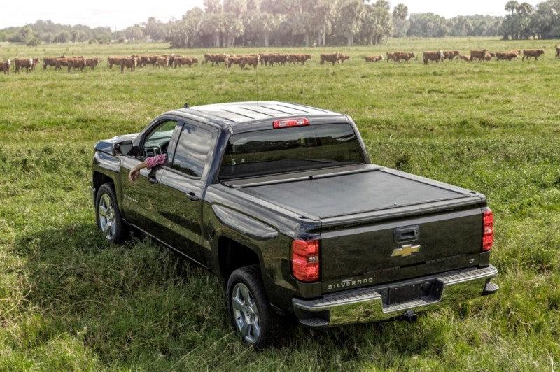 Roll-N-Lock 15-18 Chevy Silverado/Sierra 2500/3500 LB 96-3/8in M-Series Retractable Tonneau Cover - Black Ops Auto Works