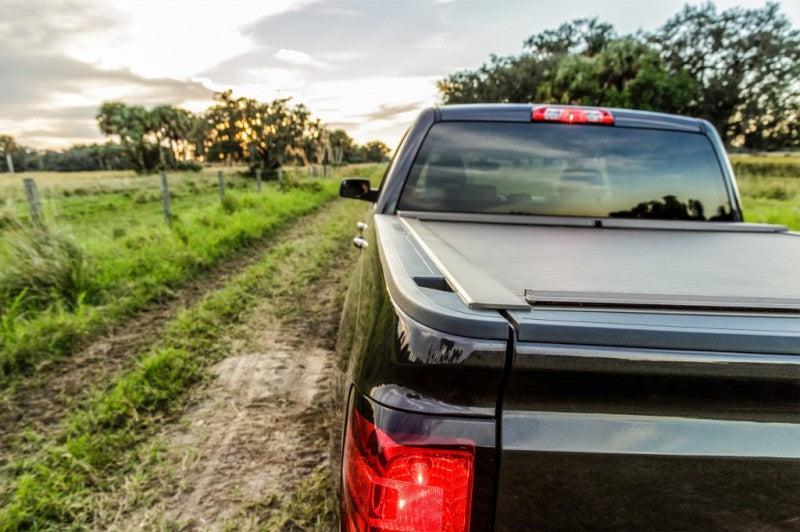 Roll-N-Lock 15-18 Ford F-150 XSB 65-5/8in A-Series Retractable Tonneau Cover - Black Ops Auto Works
