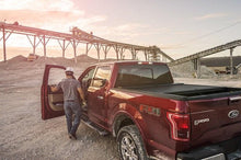 Load image into Gallery viewer, Roll-N-Lock 15-18 Ford F-150 XSB 65-5/8in A-Series Retractable Tonneau Cover - Black Ops Auto Works