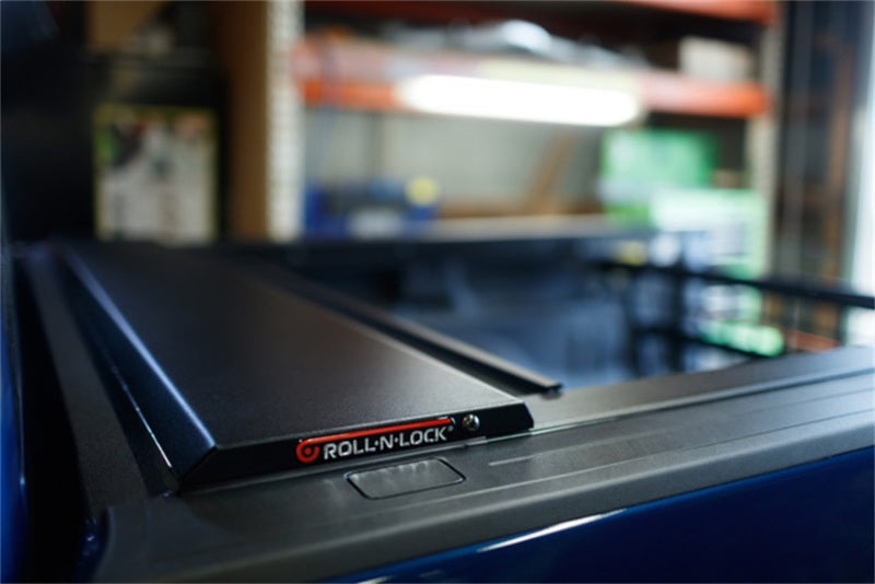 Roll-N-Lock 17-19 Ford F-250/F-350 Super Duty 80-3/8in E-Series Retractable Tonneau Cover - Black Ops Auto Works