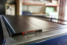 Load image into Gallery viewer, Roll-N-Lock 17-19 Ford F-250/F-350 Super Duty 80-3/8in E-Series Retractable Tonneau Cover - Black Ops Auto Works