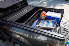 Load image into Gallery viewer, Roll-N-Lock 17-19 Ford F-250/F-350 Super Duty 80-3/8in E-Series Retractable Tonneau Cover - Black Ops Auto Works