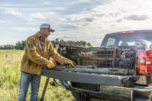 Load image into Gallery viewer, Roll-N-Lock 17-19 Ford F-250/F-350 Super Duty SB 80-3/8in Cargo Manager - Black Ops Auto Works