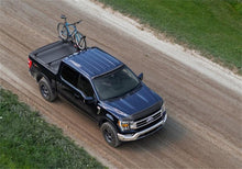 Load image into Gallery viewer, Roll-N-Lock 19-22 RAM 1500 (w/o Swing Gate - 67.4in. Bed) M-Series XT Retractable Tonneau Cover - Black Ops Auto Works
