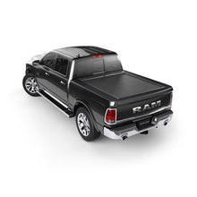 Load image into Gallery viewer, Roll-N-Lock 2019 RAM 1500 65-1/2in M-Series Retractable Tonneau Cover - Black Ops Auto Works