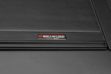 Load image into Gallery viewer, Roll-N-Lock 2019 RAM 1500 65-1/2in M-Series Retractable Tonneau Cover - Black Ops Auto Works
