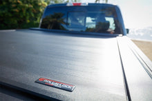 Load image into Gallery viewer, Roll-N-Lock 2020 Chevy Silverado / GMC Sierra 2500-3500 77-3/8in E-Series Retractable Tonneau Cover - Black Ops Auto Works