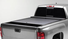 Load image into Gallery viewer, Roll-N-Lock 2020 Chevy Silverado / GMC Sierra 2500-3500 80-1/2in M-Series Retractable Tonneau Cover - Black Ops Auto Works