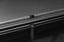 Load image into Gallery viewer, Roll-N-Lock 2020 GM Silverado / Sierra 2500/3500 6ft 10in Bed A-Series Retractable Tonneau Cover - Black Ops Auto Works
