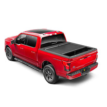 Load image into Gallery viewer, Roll-N-Lock 2021 Ford F-150 67.1in A-Series Retractable Tonneau Cover three-quarter rear view