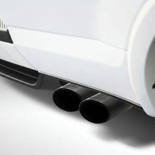 Load image into Gallery viewer, Roush 422318 4-inch black dual exhaust tips installed below a white 2015-2024 Ford F-150 5.0L rear bumper