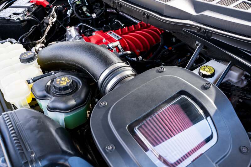 Roush 422349 705HP Red Edition supercharger kit for 2021-2026 F-150, installed beside the airbox and intake tube