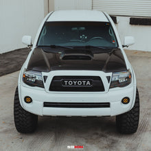Load image into Gallery viewer, Seibon Seibon 05-11 Toyota Tacoma TR-Style Carbon Fiber Hood