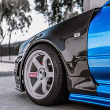 Load image into Gallery viewer, Seibon Seibon 99-01 Nissan Skyline R34 Carbon Fiber Fenders Pair