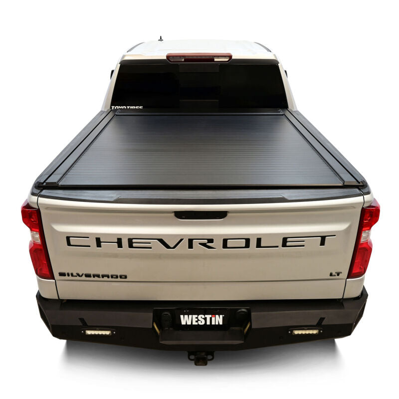 Westin manual retractable tonneau cover installed on a 2019-2026 Chevrolet Silverado 1500