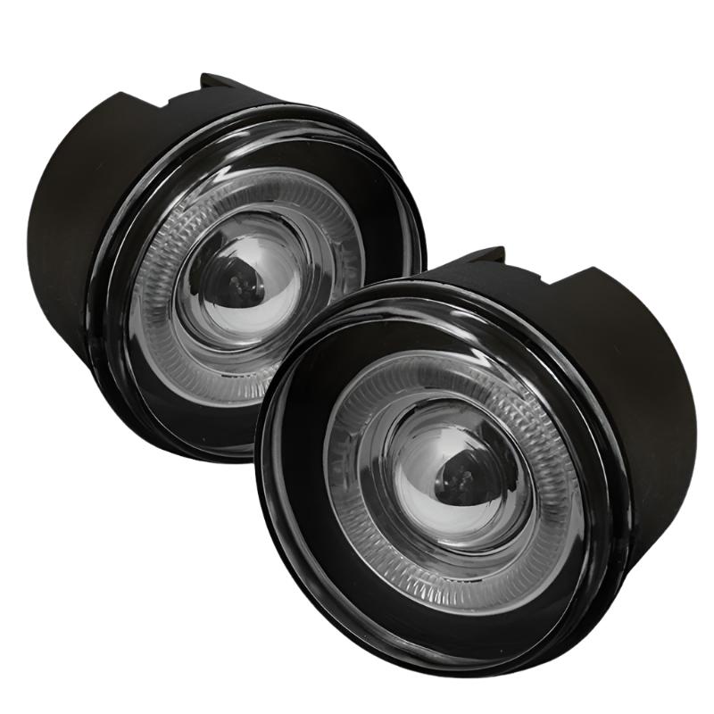 Spyder LED halo rings illuminated on smoked projector fog lights Jeep WK