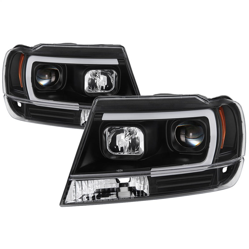 Close-up of Spyder projector lens halo and black housing detail on 5085221 headlights
