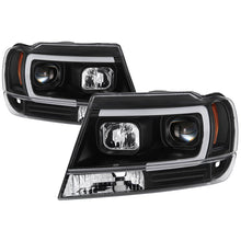 Load image into Gallery viewer, Close-up of Spyder projector lens halo and black housing detail on 5085221 headlights