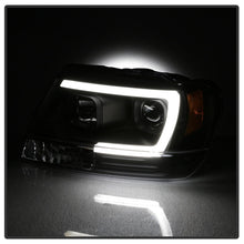Load image into Gallery viewer, Spyder 5085221 projector headlights low beam pattern at night Jeep Grand Cherokee WJ