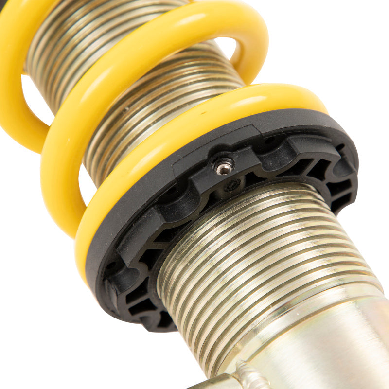 Composite spring perch and stainless insert detail