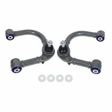Load image into Gallery viewer, SuperPro front upper control arm pair, top-down view showing curved arm and ball joints