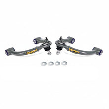 Load image into Gallery viewer, SuperPro front upper control arm pair with polyurethane bushings and hardware, angled view