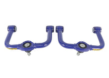 Load image into Gallery viewer, Superpro 05-21 Nissan Frontier - Fixed Offset Upper Control Arm Set - Camber/Caster Correction Superpro SPRTRC6540