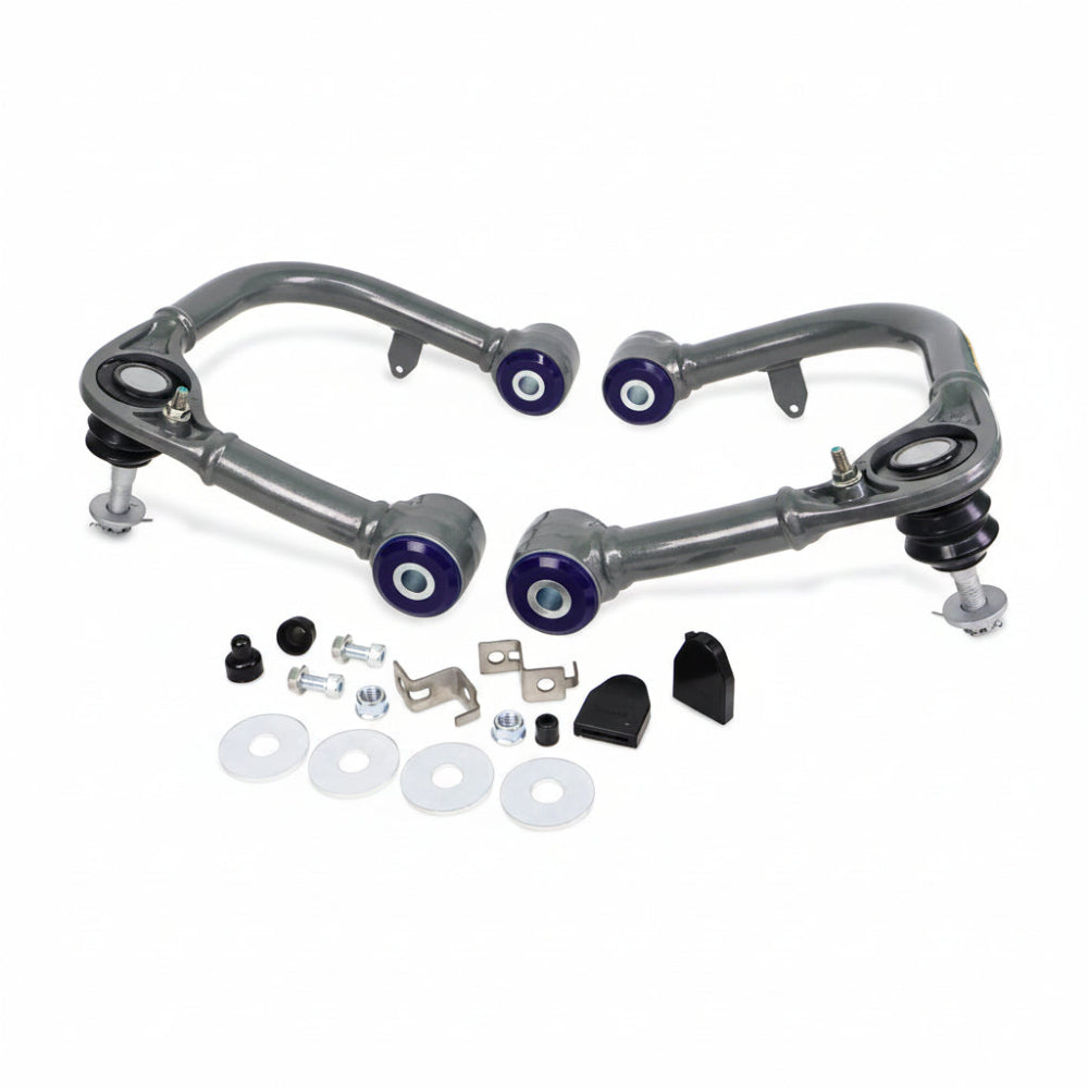 SuperPro front upper control arm pair, top-down view showing ball joint and mounting studs