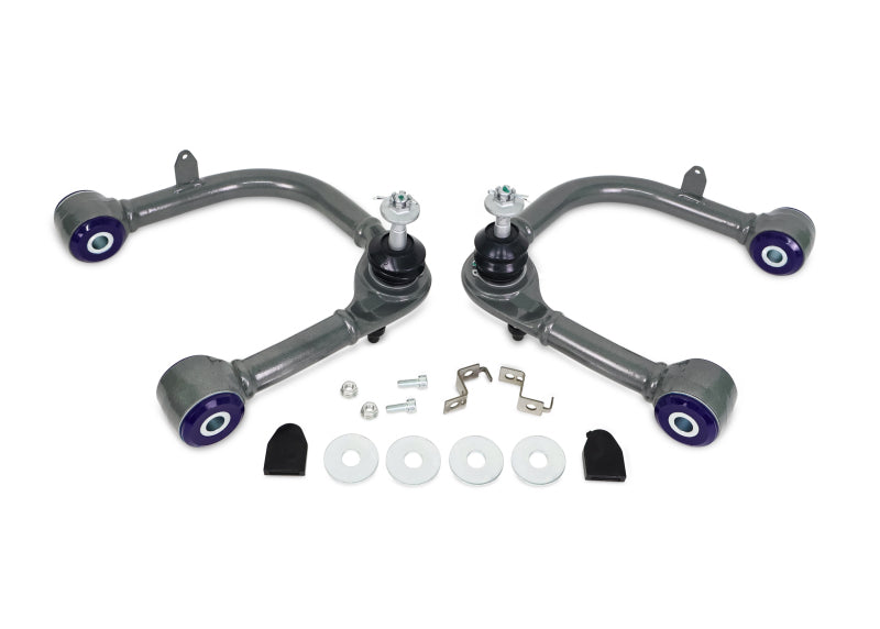 SuperPro front upper control arm pair, front view showing bushing alignment and hardware