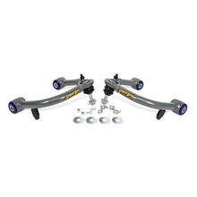 Load image into Gallery viewer, SuperPro front upper control arm pair with polyurethane bushings and hardware kit, angled view
