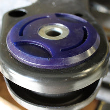 Load image into Gallery viewer, Close-up of SuperPro SPF3946K polyurethane rear subframe bushings for BMW 1M E82 showing design and material