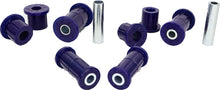Load image into Gallery viewer, Close up of SuperPro polyurethane leaf spring bushings and plated sleeves